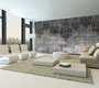 wall in a living room featuring a stunning wallpaper of chandeliers embedded in concrete