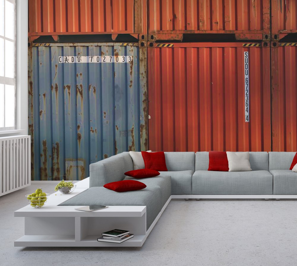 in this living room, a wall on which is a neo-industrial wallpaper representing containers