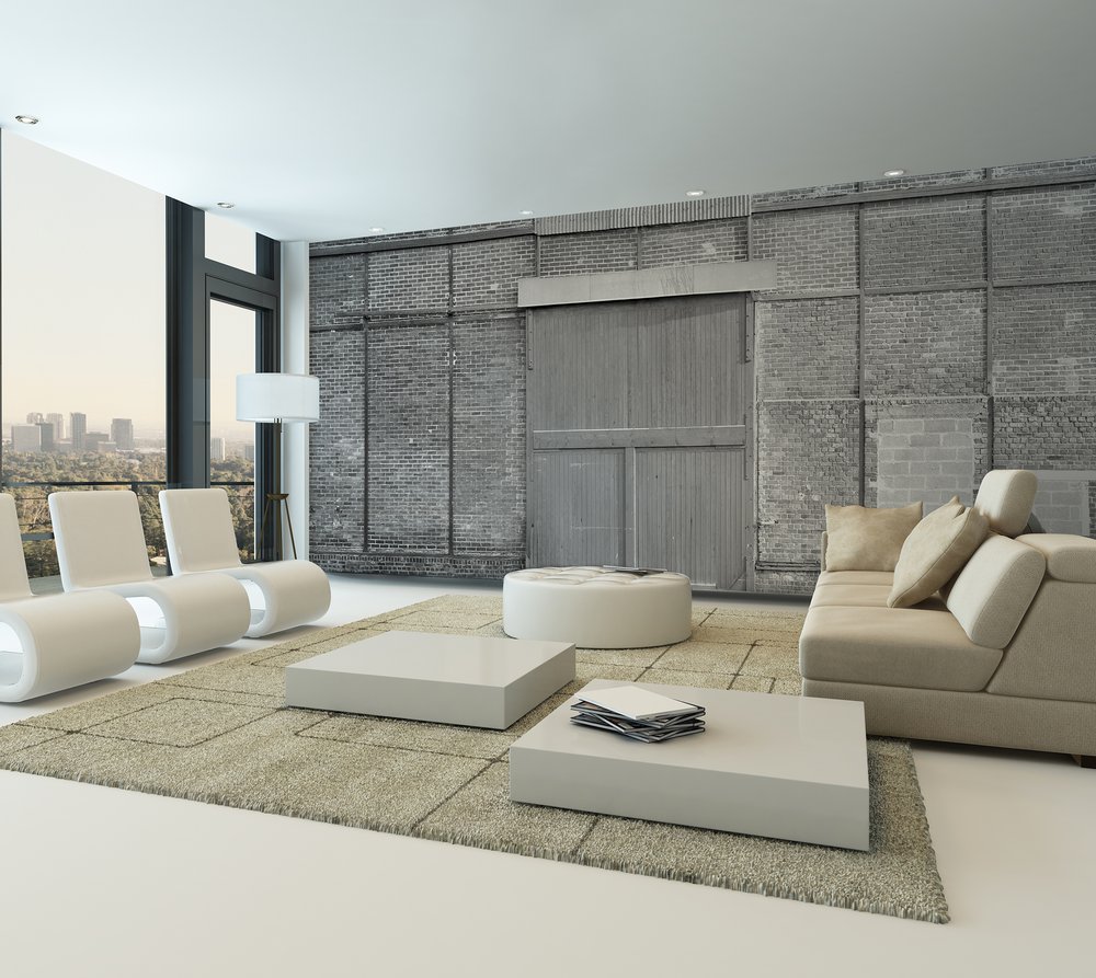 on the walls of this living room a neo-industrial wallpaper of bricks in black and white