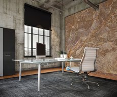 On the wall of an office this wallpaper representing a slate of ochre color warms the atmosphere