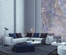 wall of a living room with a zen wallpaper looking like blue slate