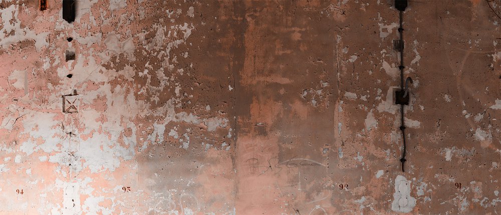 ethnic panoramic wallpaper representing a raw clay color wall