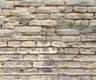 detail: panoramic wallpaper representing a beige brick wall