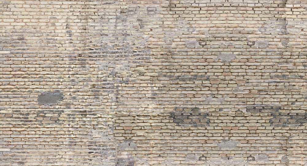 panoramic wallpaper representing a beige brick wall
