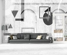 In a loft: trendy panoramic wallpaper with black geometric patterns painted on bricks